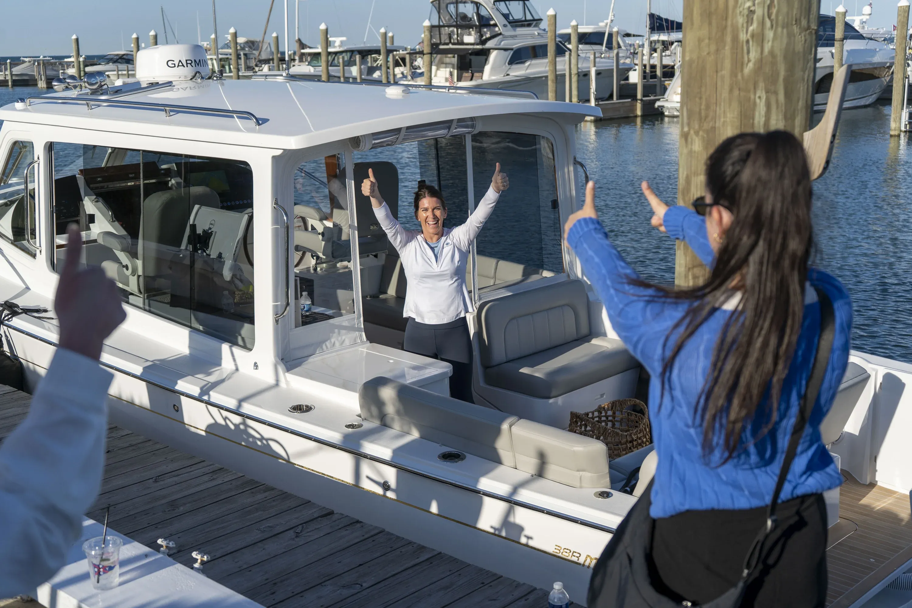 Women boating together during She's the Captain program